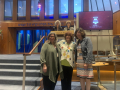 2024 Outgoing Admin: Joan Lowenstein, Ellen Haspel, Esther Racoosin, Toby Maser on podium