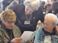 Eve & Bea receiving a birthday card