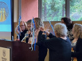 Marcy recycles ribbons used by Torah Fund on the Queen Mary